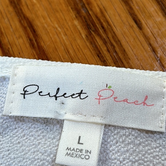 Perfect Peach cream color ruffle sleeve top.  Size Large.  Excellent condition. - Picture 3 of 10